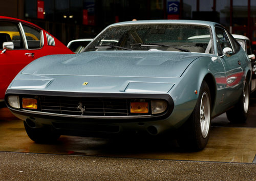 Free Classic Ferrari parked outdoors in Switzerland, showcasing vintage luxury and design. Stock Photo