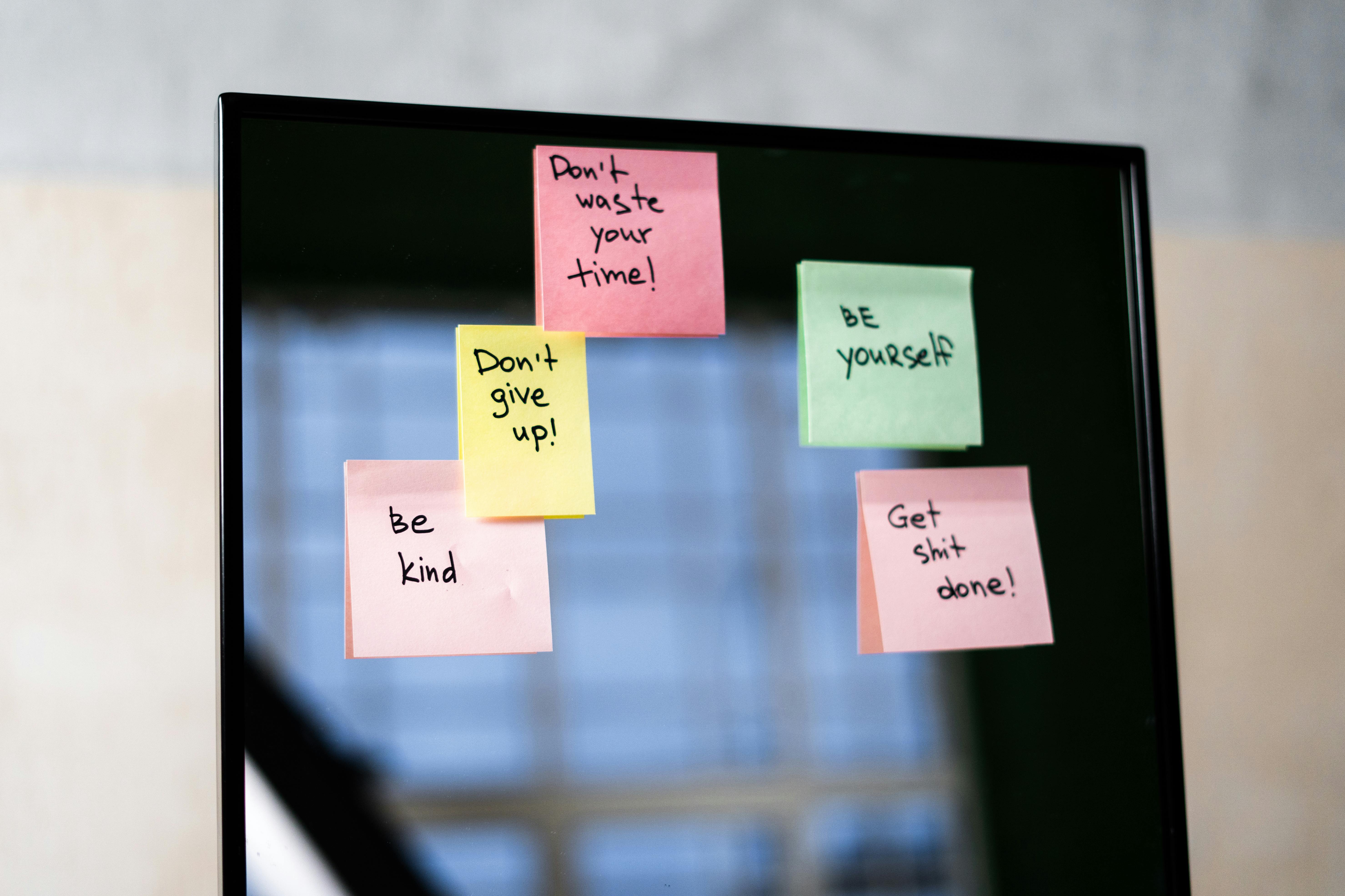 Pink Sticky Notes on Glass Mirror · Free Stock Photo