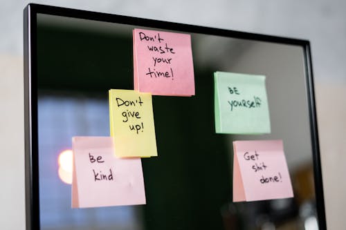 Sticky Notes on Glass Wall