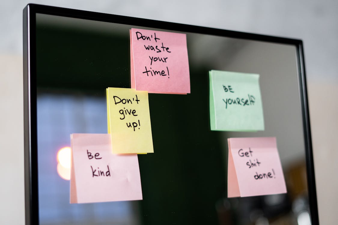 Free Sticky Notes on Glass Wall Stock Photo