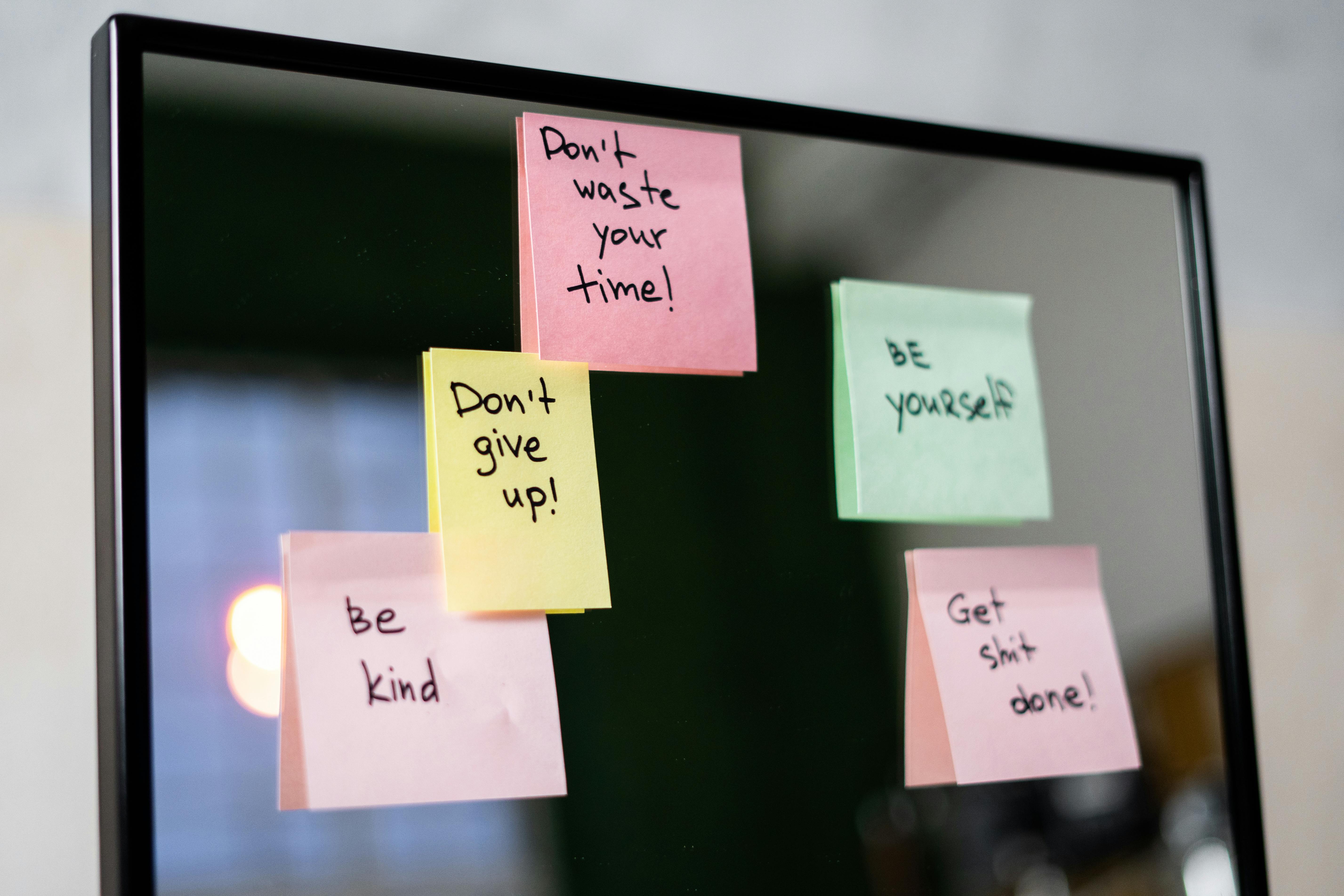 Sticky Notes on Glass Wall · Free Stock Photo