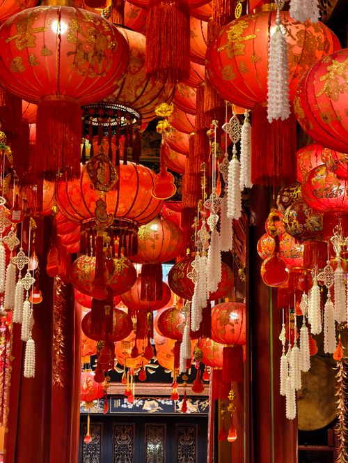 Free A captivating display of red lanterns in a traditional Bangkok temple setting. Stock Photo