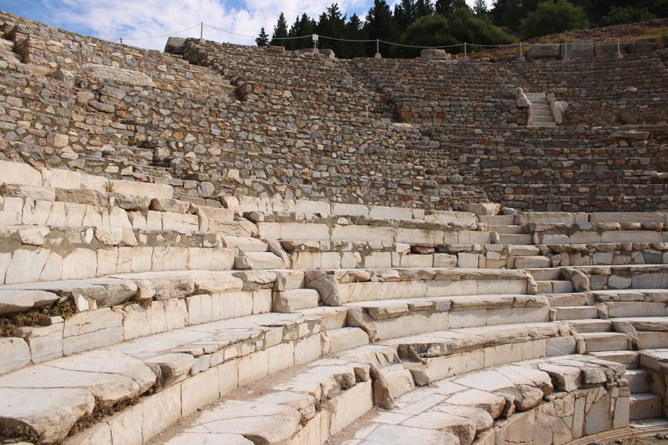 Ancient ruins of Delphi archaeological site in Greece, nestled in a mountainous landscape