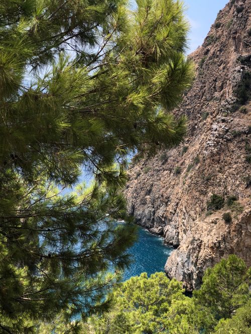 Free Breathtaking view of the Alanya cliffs and Mediterranean coast with lush greenery. Stock Photo
