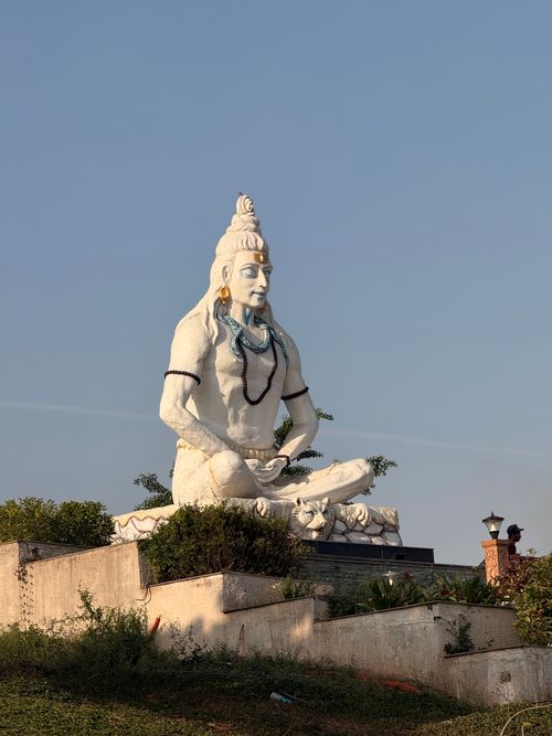 Free Shiva statue at sunrise in Ujjain, India. Captivating spiritual landmark. Stock Photo