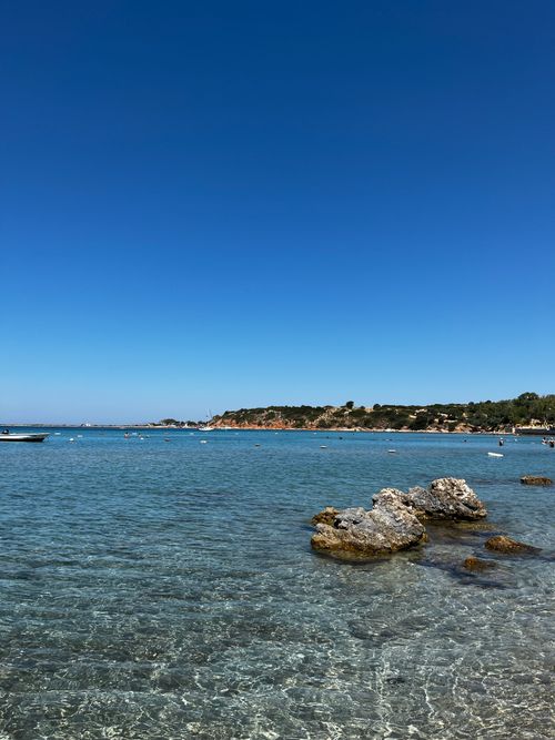 Free Crystal-clear waters of the Aegean Sea with a beautiful coastline in Bodrum, Turkey. Stock Photo