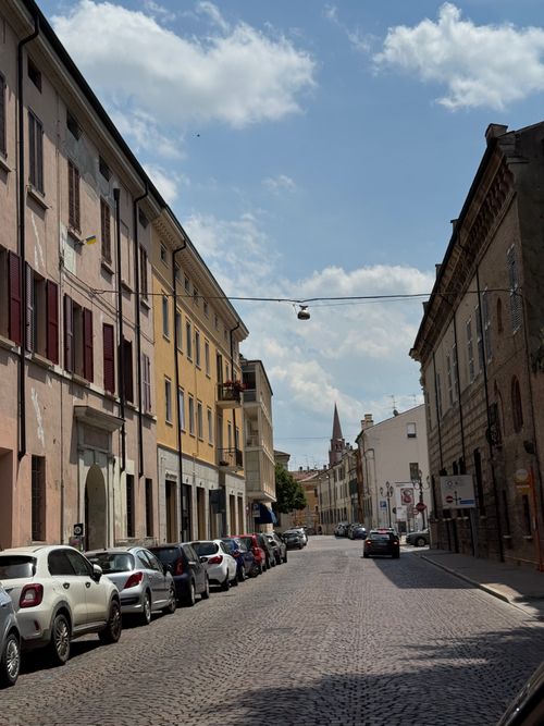 Free Picturesque street scene in Mantova, Lombardia, Italy, featuring historic architecture and cobblestone roads. Stock Photo