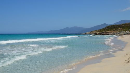 Free Explore the breathtaking shores of Corsica's wild beaches with crystal clear waters and scenic views. Stock Photo