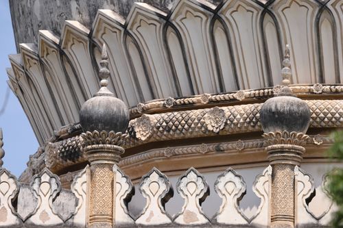 Free Close-up of intricate architectural details on a historic dome with ornate carvings and patterns. Stock Photo