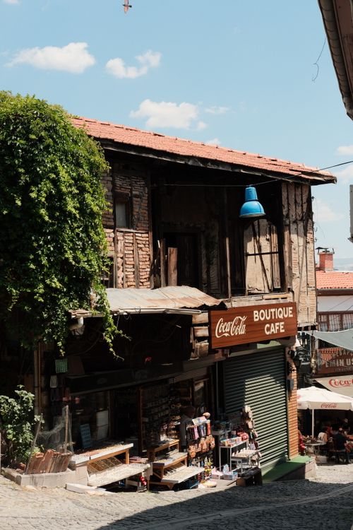 Free Quaint cafe in a historic district, showcasing rustic architecture and inviting ambiance. Stock Photo