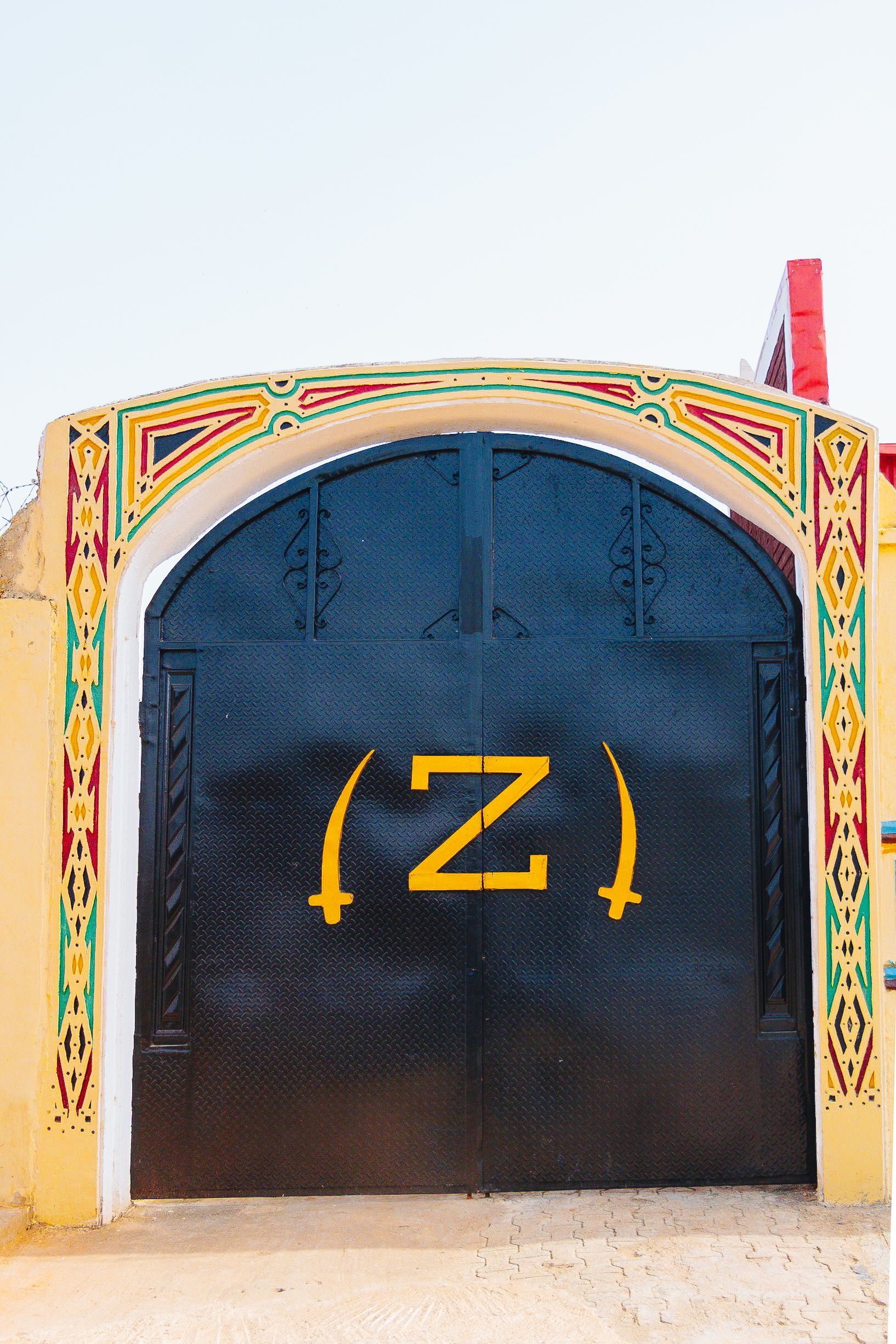 A vibrant and artistic gateway in Zaria, showcasing traditional Nigerian design elements.