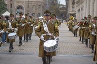 Chilean military band marching in a ceremonial parade near La Moneda Palace, Santiago.