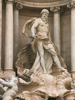 Close-up of a majestic statue at Rome's iconic Trevi Fountain, rich in history.