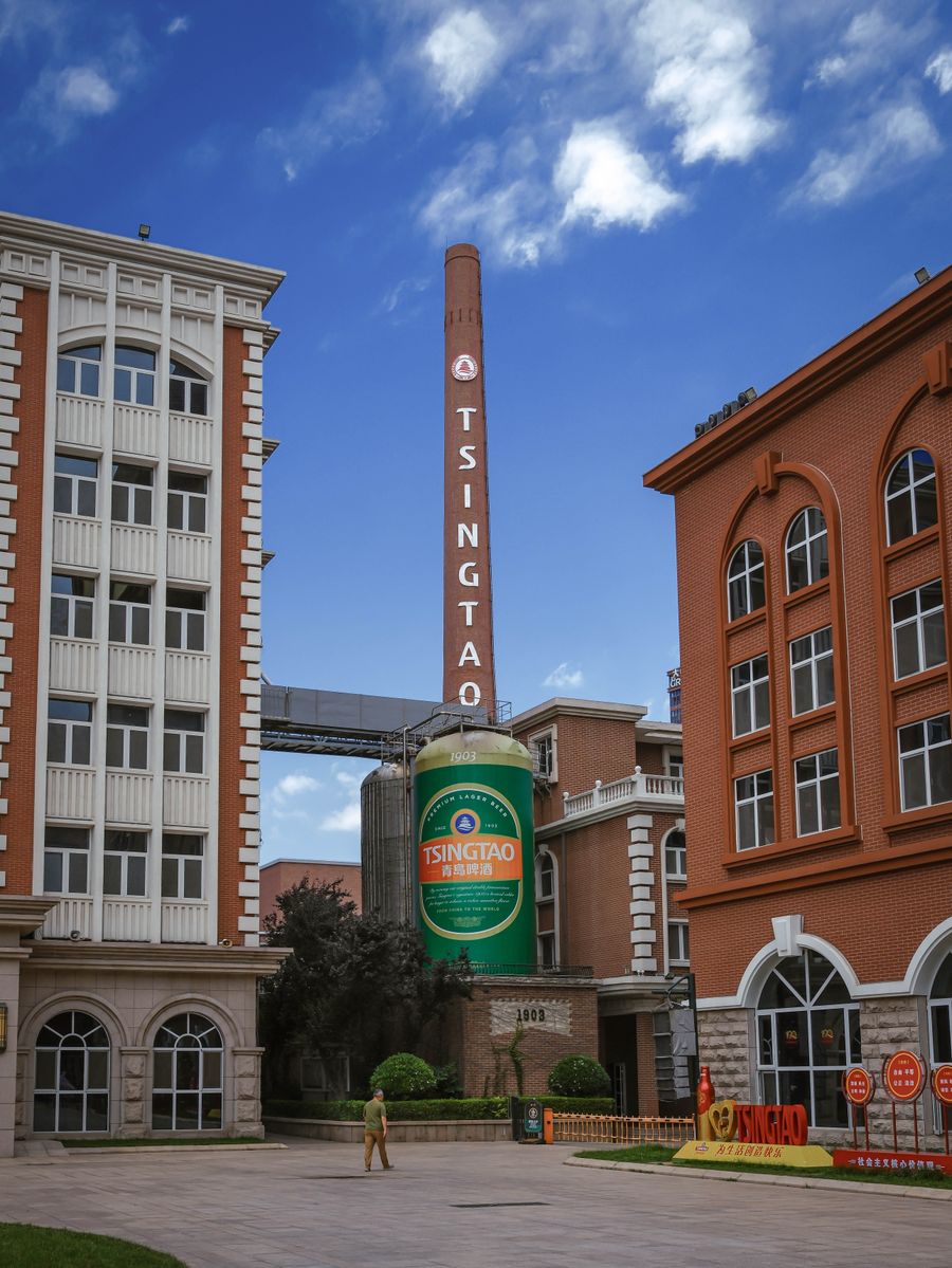 The red-brick Tsingtao Brewery landmark with its brewing tower and beer-can sculpture