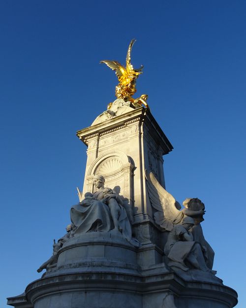Free Elegant view of the Victoria Memorial with a vivid blue sky, located in London, UK. Stock Photo