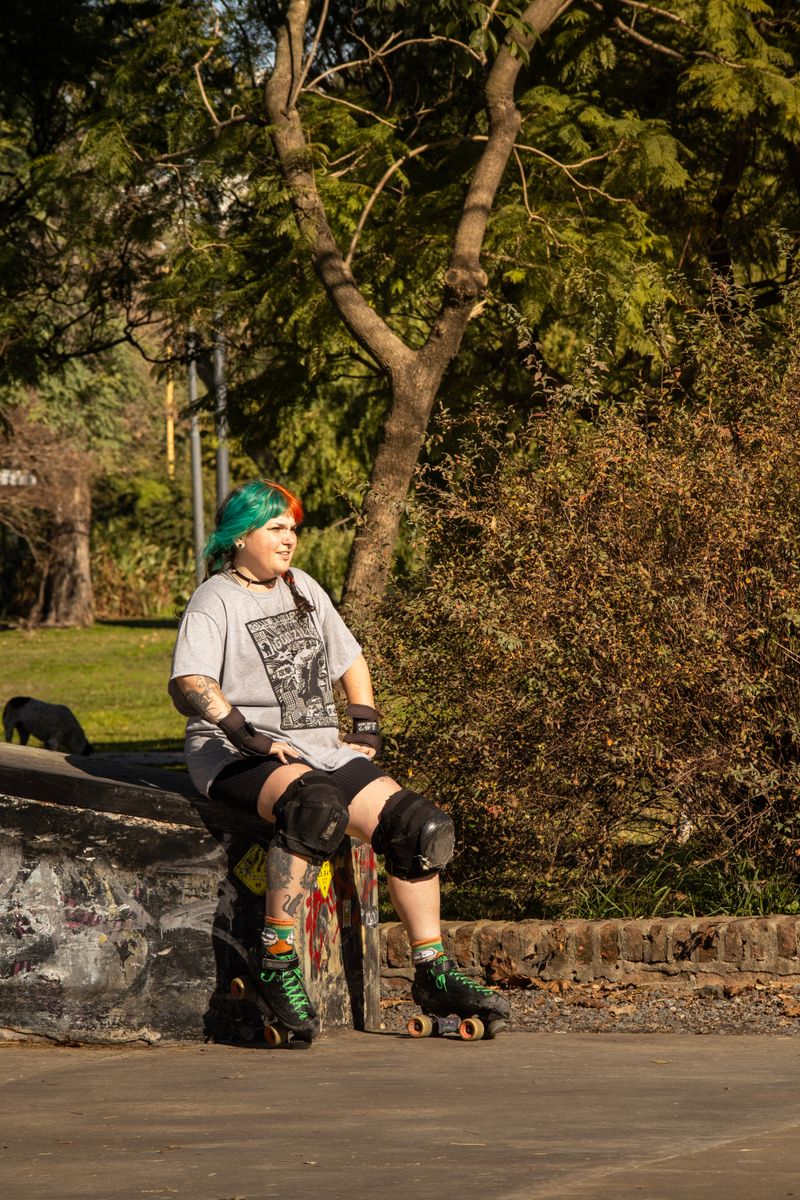 Roller skater relaxing on a ramp