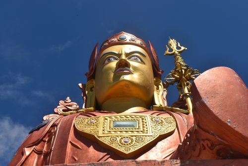 Free A captivating view of the Padmasambhava statue under a clear blue sky. Stock Photo