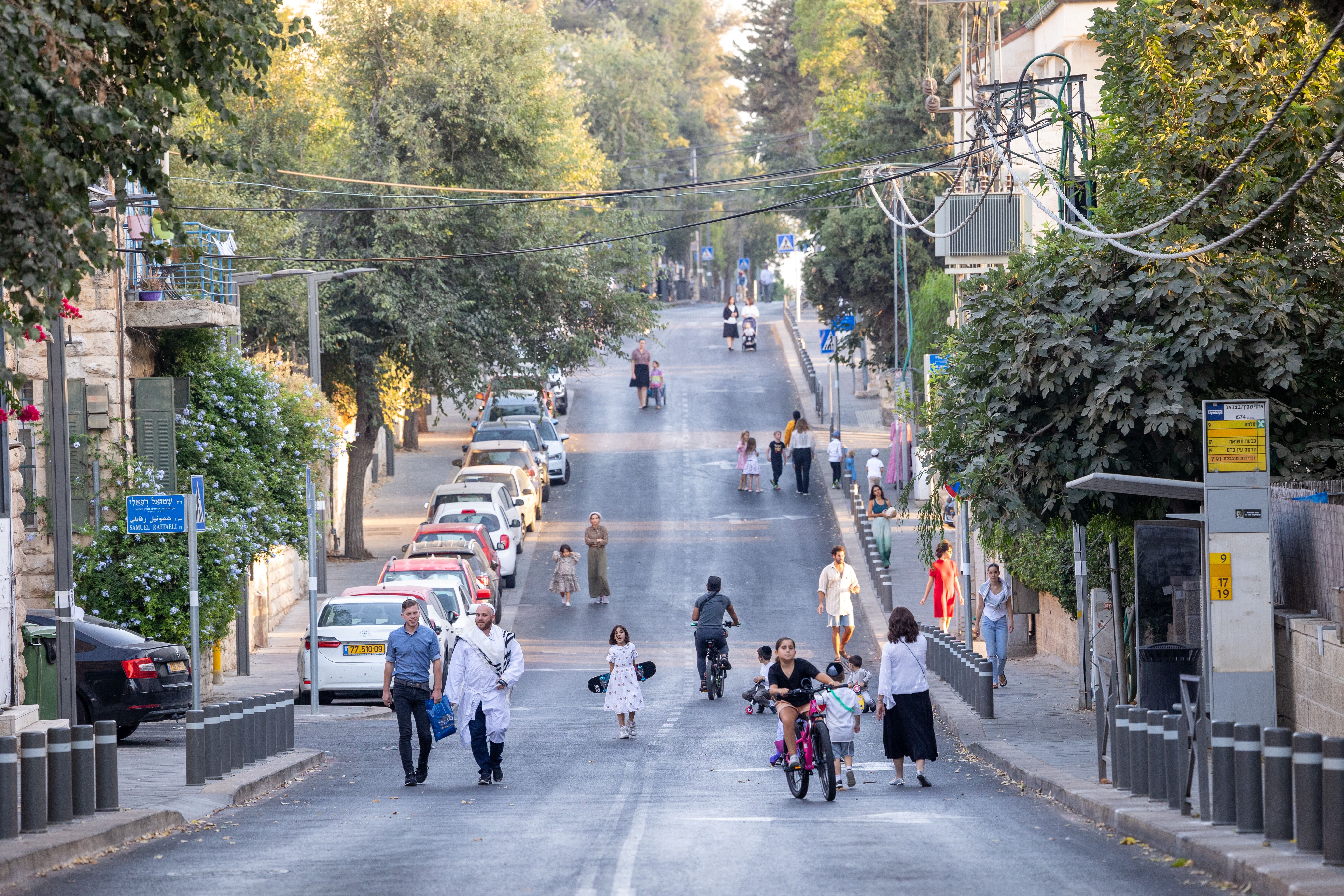 Modern street in Jerusalem with visible 5G network infrastructure
