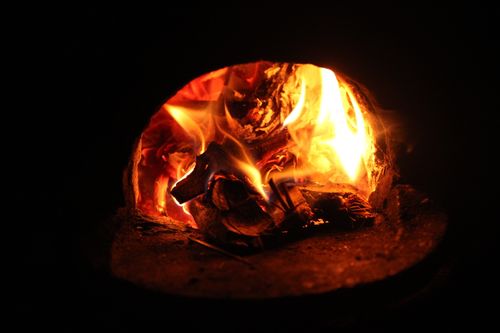 Flames inside a wood-fired kiln, photo by Jahra Tasfia Reza on Pexels