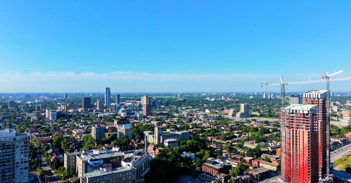 Cranes over a Toronto construction site as building permits hit a record