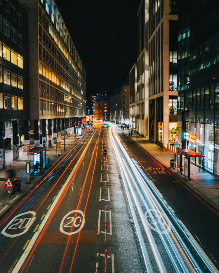 Traffic On Street In Downtown At Night