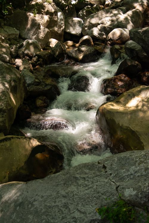 Free A tranquil waterfall flowing over rocks in Sapadere, showcasing Antalya's natural beauty. Stock Photo