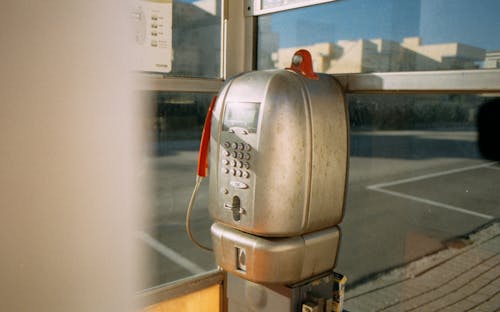 Silver and Black Telephone Booth