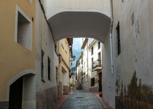 Free A picturesque street in El Castell de Guadalest, Valencia, showcasing historic architecture. Stock Photo