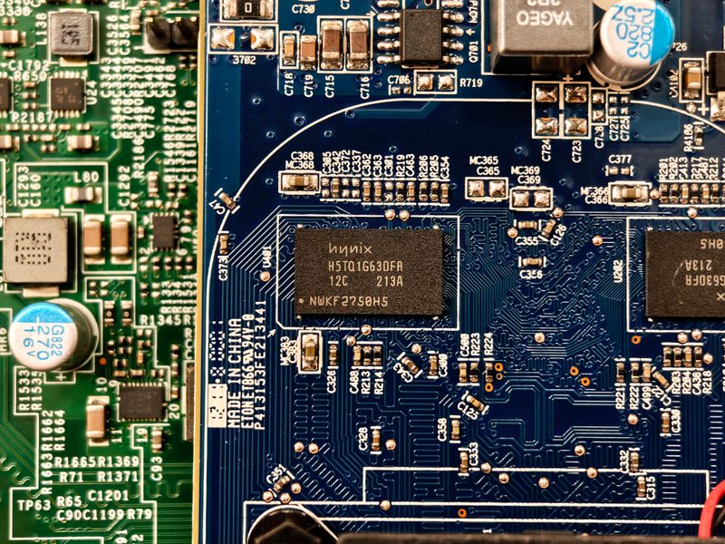 Close-up of a circuit board with intricate electronic components and pathways