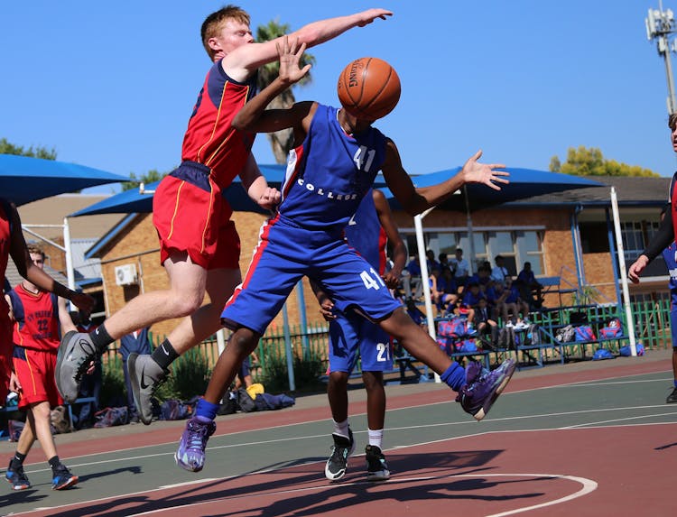 Men Playing Basketball