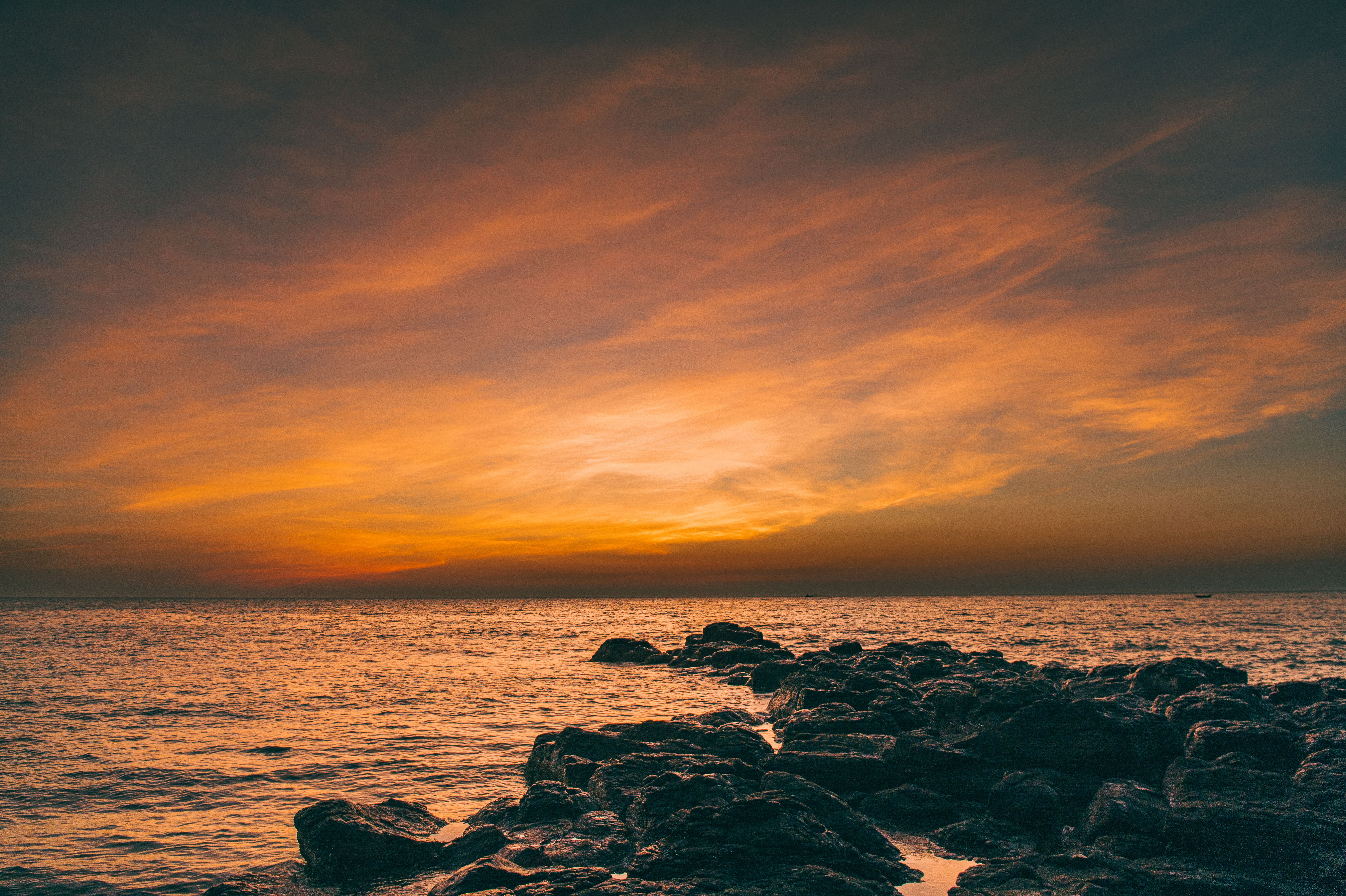 Dramatic Sunset Over Rocks, Quảng Trị Coastline · Free Stock Photo