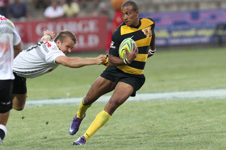 Men Playing Rugby