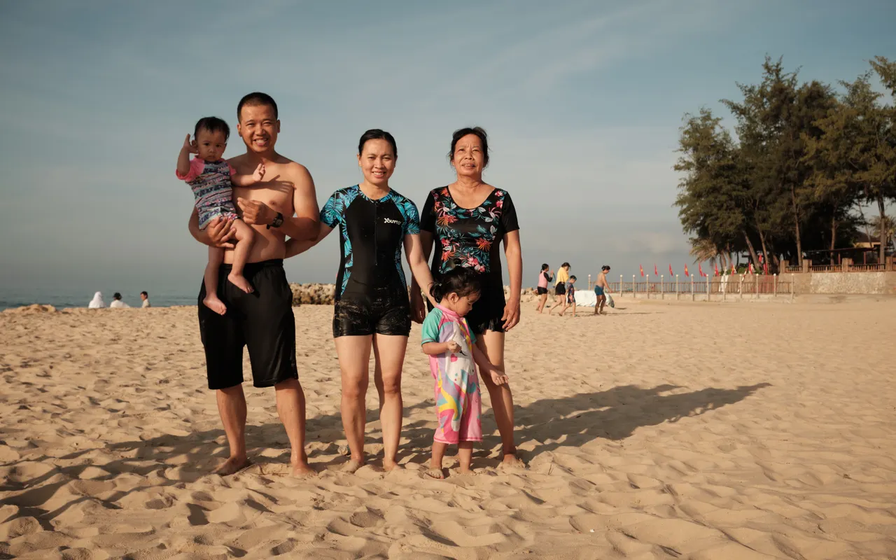 A family enjoying a sunny beach holiday