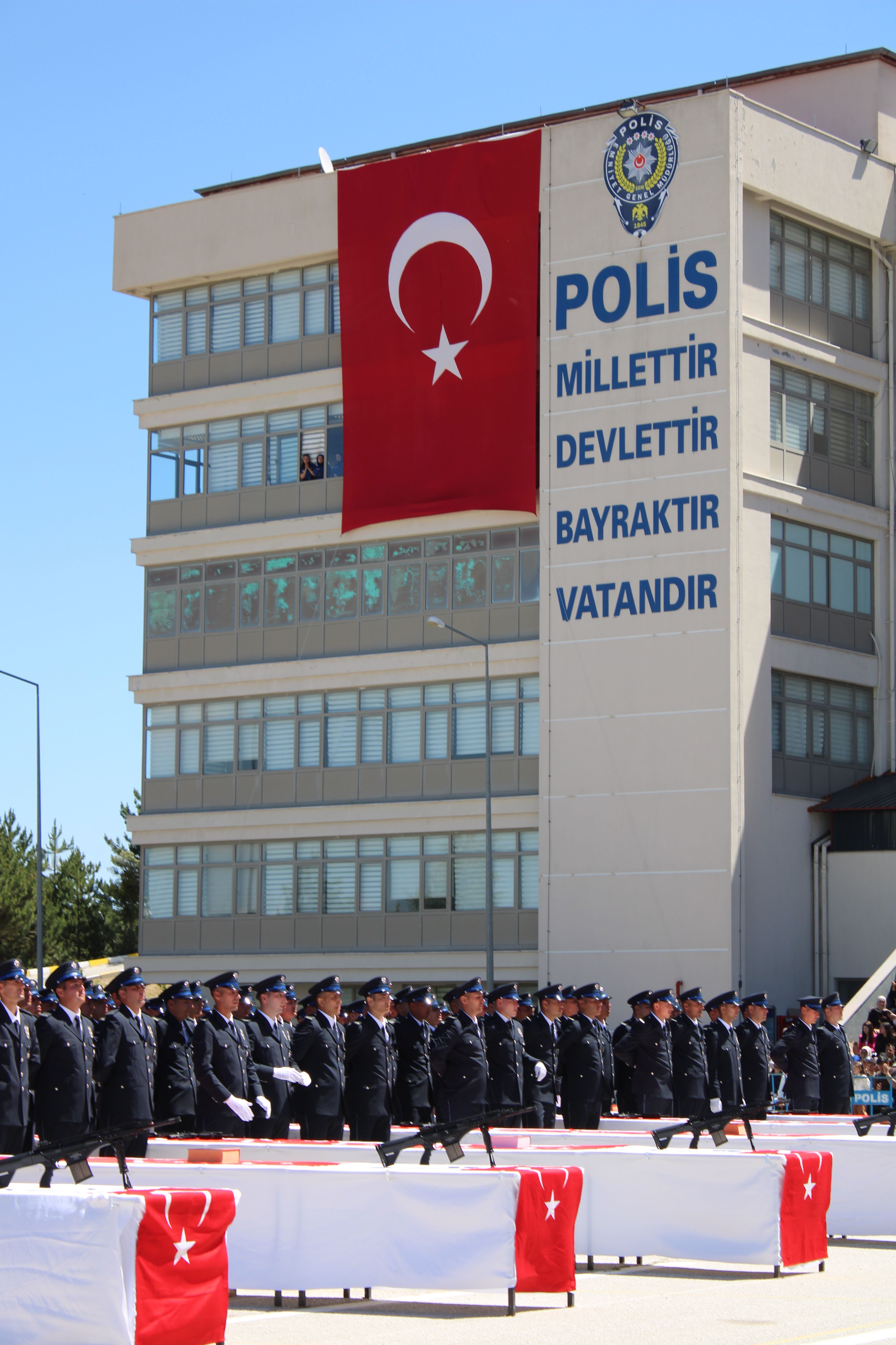 Turkish police officers march in formation during a parade in Yozgat, Türkiye.