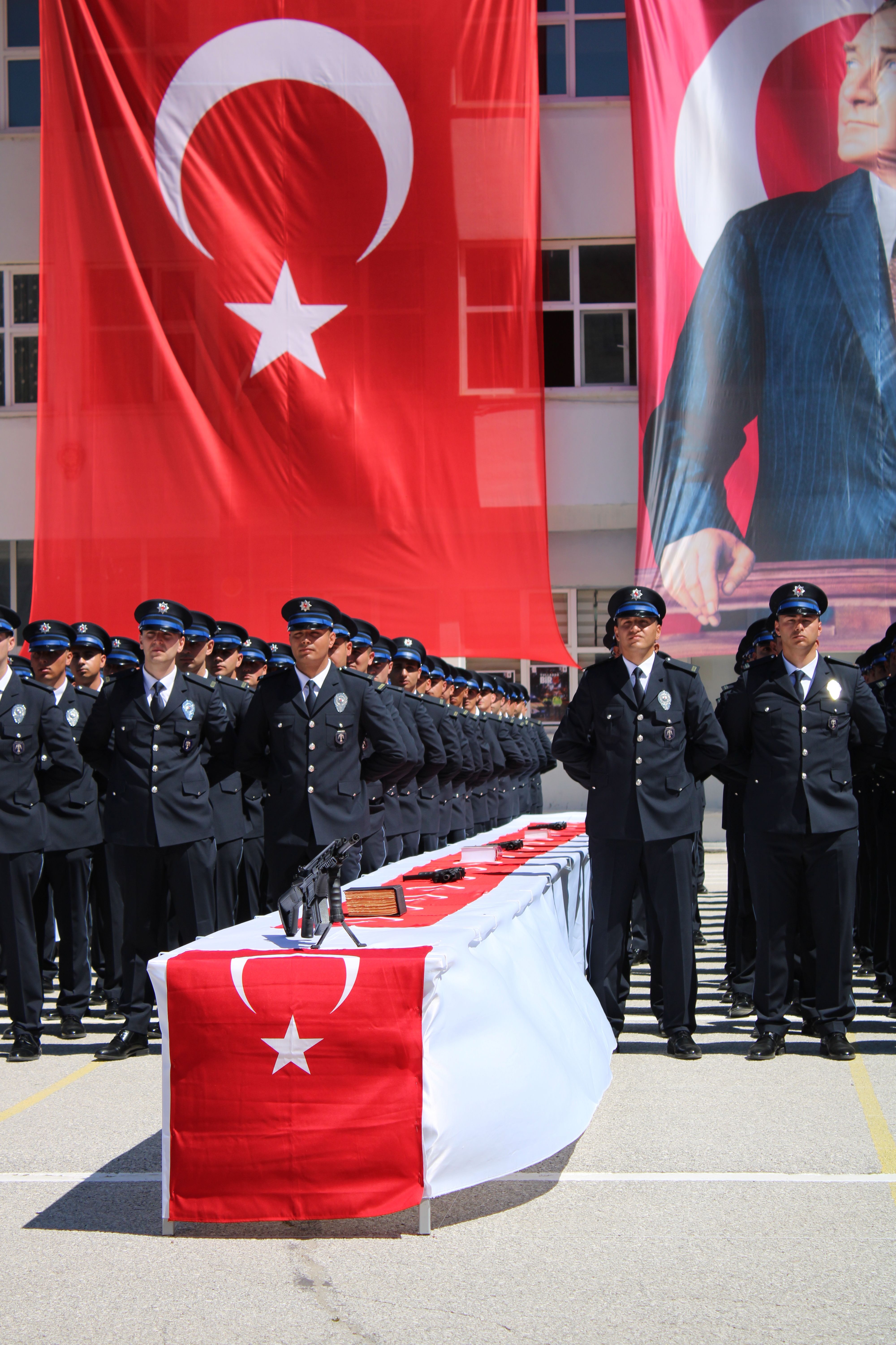 Police officers in uniform stand during a graduation ceremony in Yozgat, Türkiye.