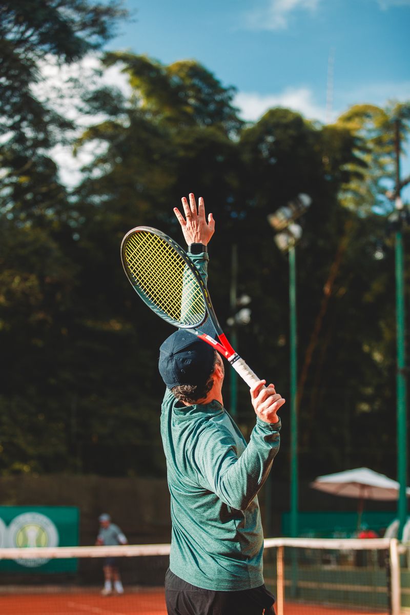 Tennis player serving
