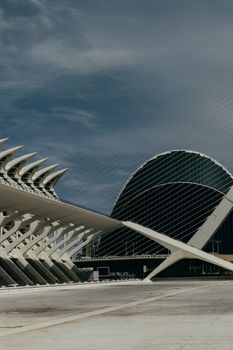 Iconic modern architecture in Valencia at the City of Arts and Sciences with clear sky backdrop.