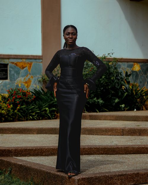 Elegant Young Woman in a Black Dress · Free Stock Photo