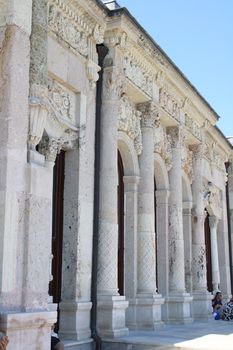 Elegant stone columns and architectural details of a historic building facade.