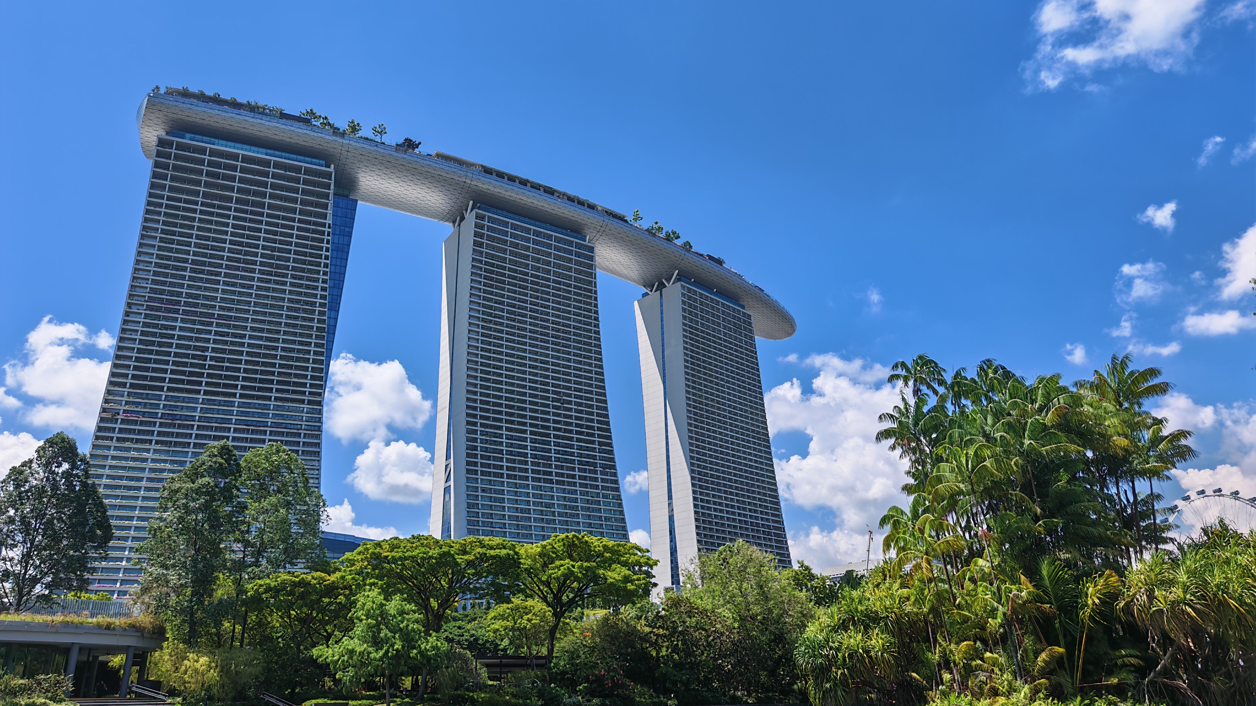 A futuristic city skyline with blockchain symbols integrated into the buildings