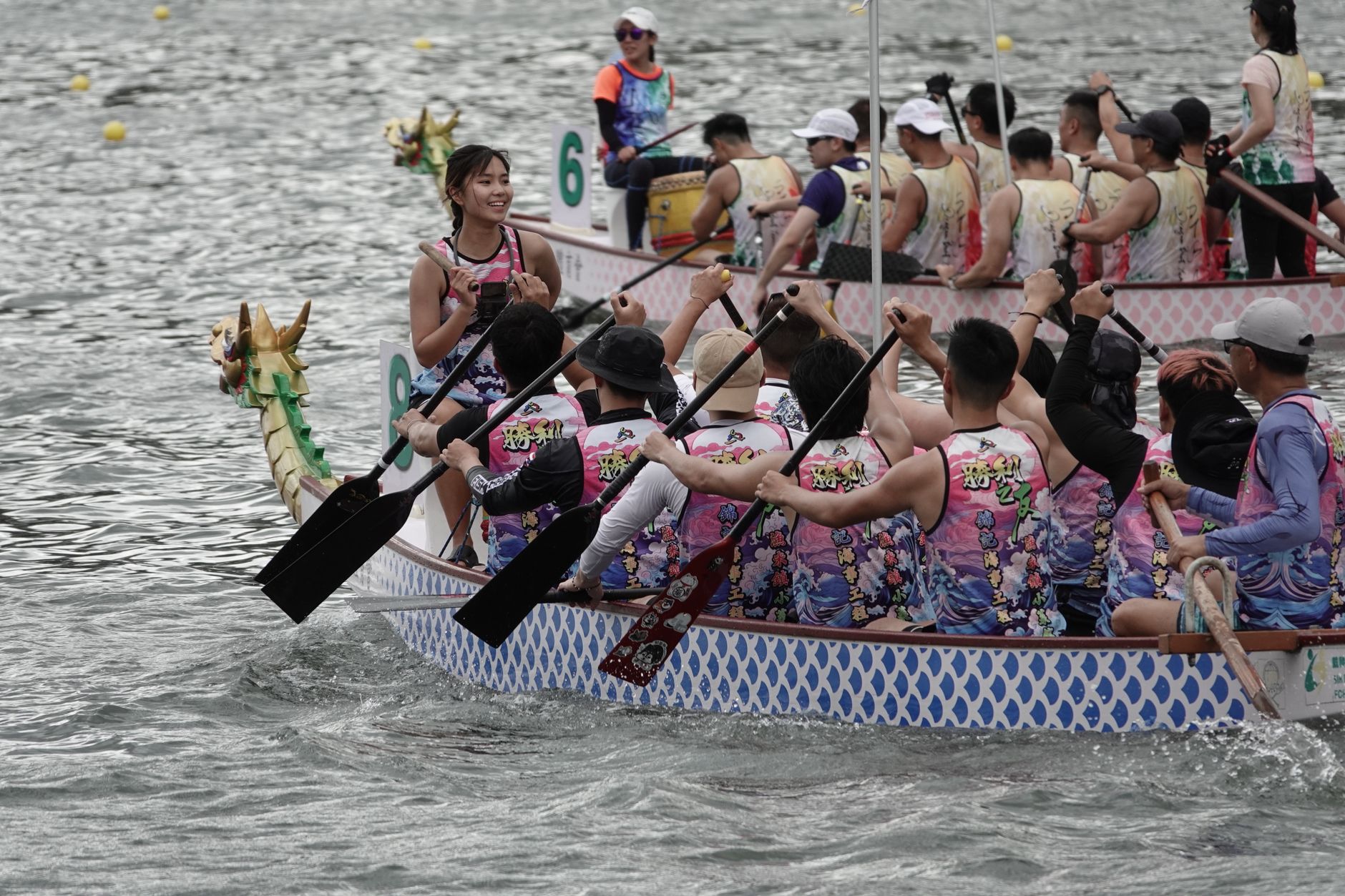 Exciting dragon boat race in Hong Kong, showcasing teamwork and vibrant culture on the water.