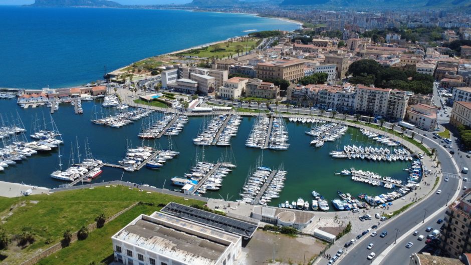 Best Boat Tour of Ortigia Island and Sea Caves Review: Syracuse's Best-Kept Secret from the Water Review 2026 - Explore the vibrant marina and urban landscape of Palermo from above, showcasing bustling harbor life.