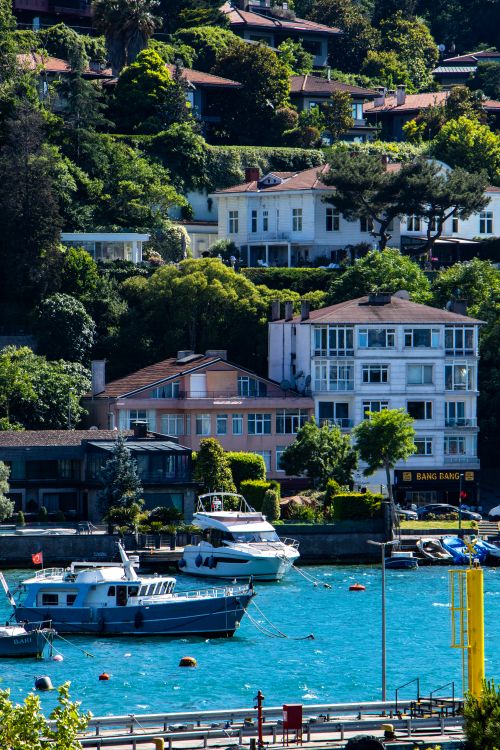 Free Charming houses and boats along the Bosphorus in Istanbul, Turkey. Stock Photo