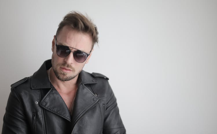 Man In Black Leather Jacket Wearing Black Sunglasses