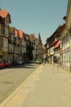 Charming view of historic half-timbered houses on a sunny day in Quedlinburg, Germany.