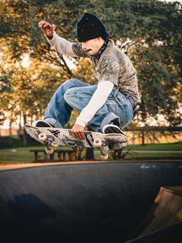 Dynamic shot of a skateboarder mid-air at a Buenos Aires skatepark. Energetic and vivid capture.. dynamic, shot, skateboarder