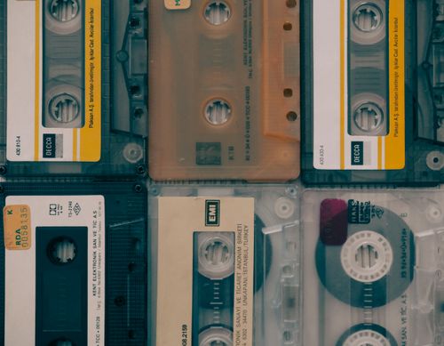 Free A flat lay of assorted vintage audio cassettes, showcasing retro music media. Stock Photo