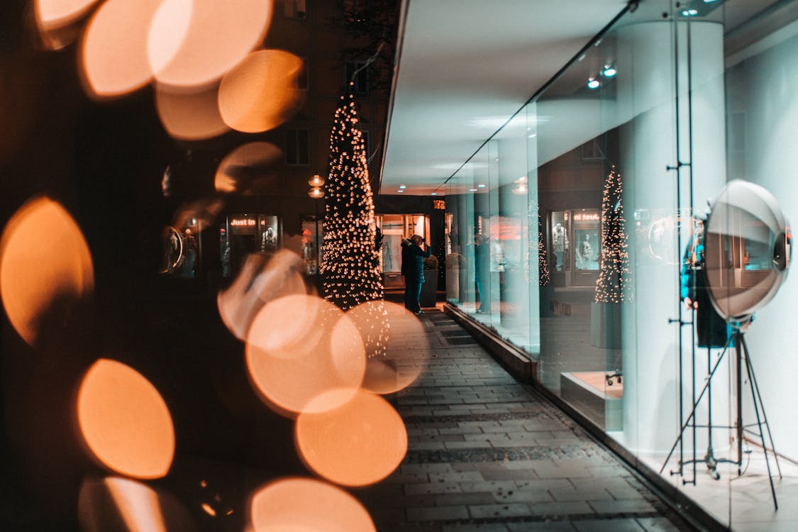 Showcase of light modern shop during Christmas holidays