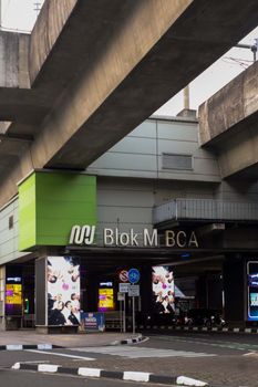 Urban view of Blok M underpass in Jakarta, Indonesia, showcasing modern architecture and city life.