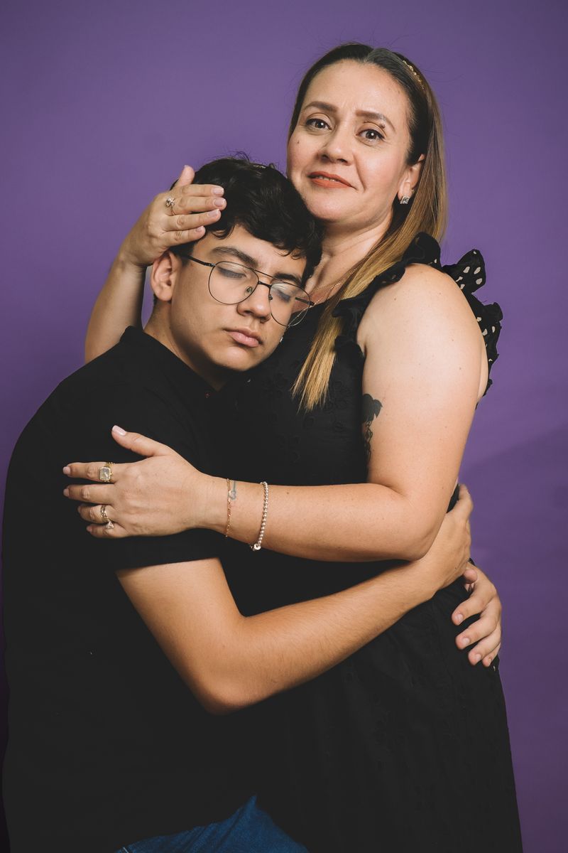 Family embracing, photo by walter Cordero on Pexels